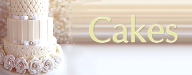 A tiered white wedding cake, representing bakers and caterers on an Asian wedding directory.